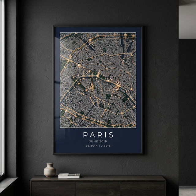 Satellite print of Paris framed on a dark wall